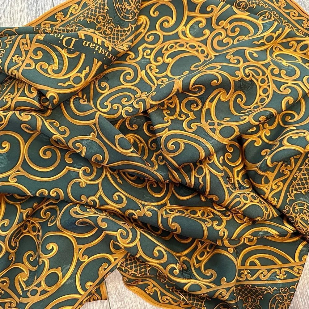 Vintage Dior silk scarf with hidden logo 35x35”rolled hem. Tag on side.